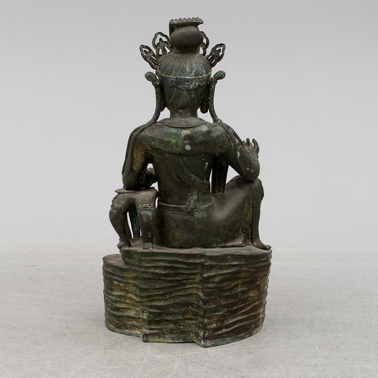 A mid 20th century metal Guan Yin figurine, China.