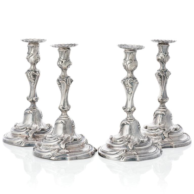 Four Swedish Rococo silver candlesticks, mark of Arvid Floberg, Stockholm 1768 and 1779.