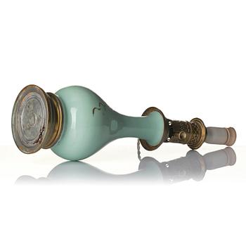 A celadon vase made into a lamp, circa 1900.
