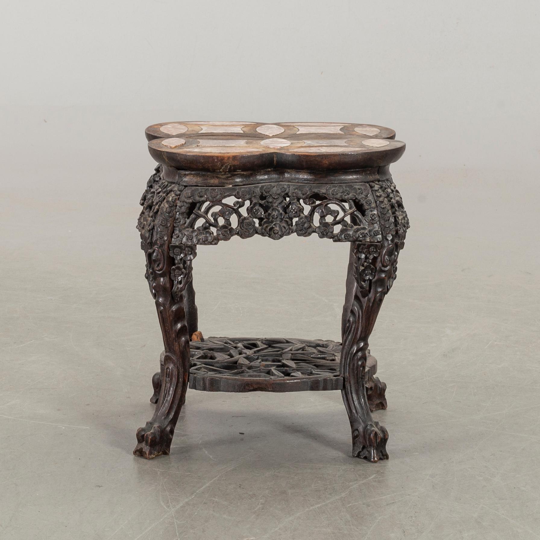 A SMALL CHINESE TABLE/STOOL, around the year 1900.