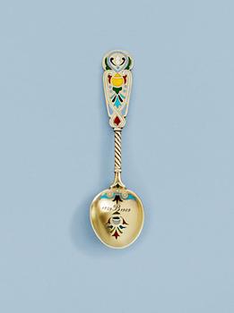 A RUSSIAN SILVER-GILT AND ENAMEL TEA-SPOON, Makers mark of Ivan P. Chlebnikov, Moscow 1908-1917.