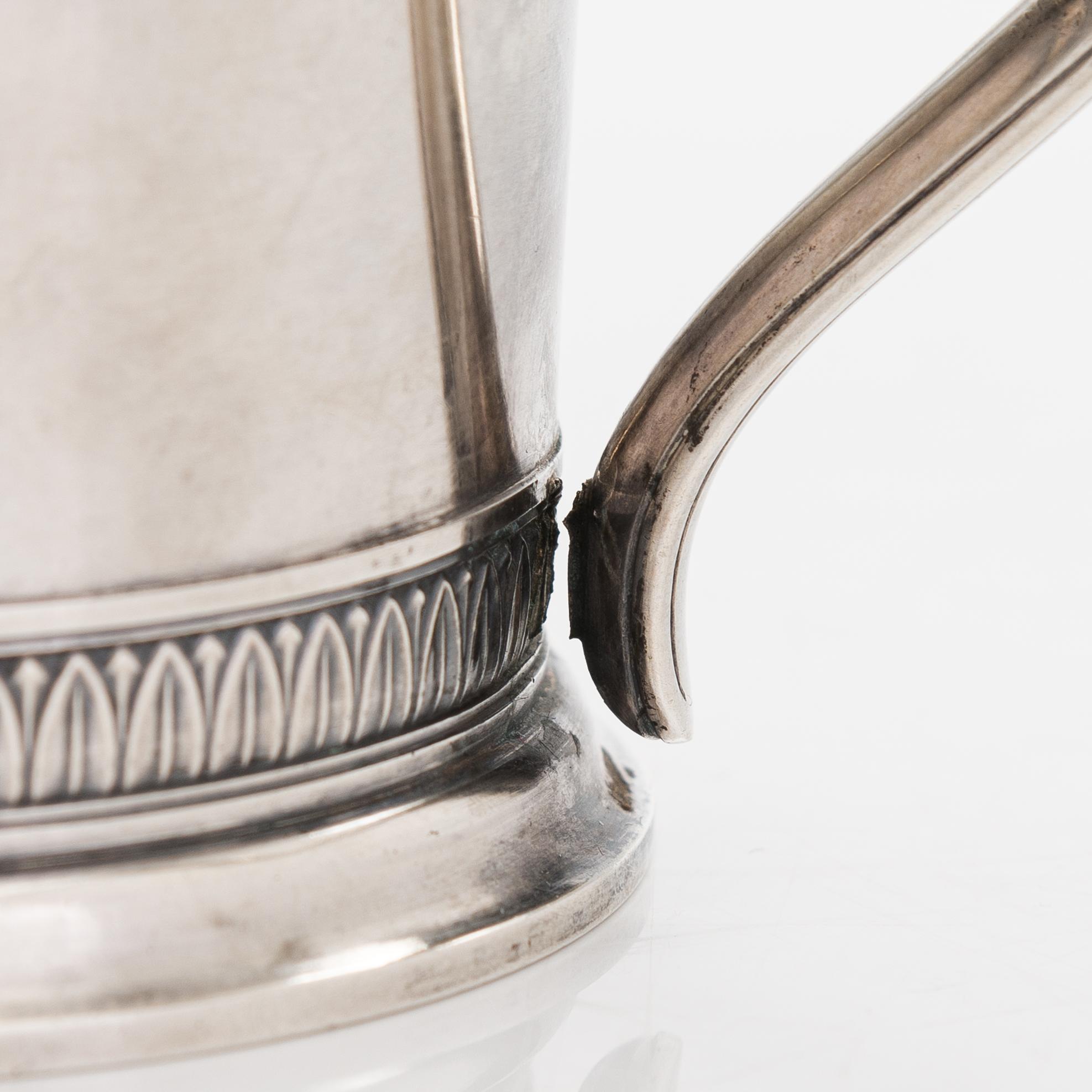 K. Fabergé, teglashållare, ett par, silver, stämplade med hovleverantörsmärke, Moskva 1908-17.