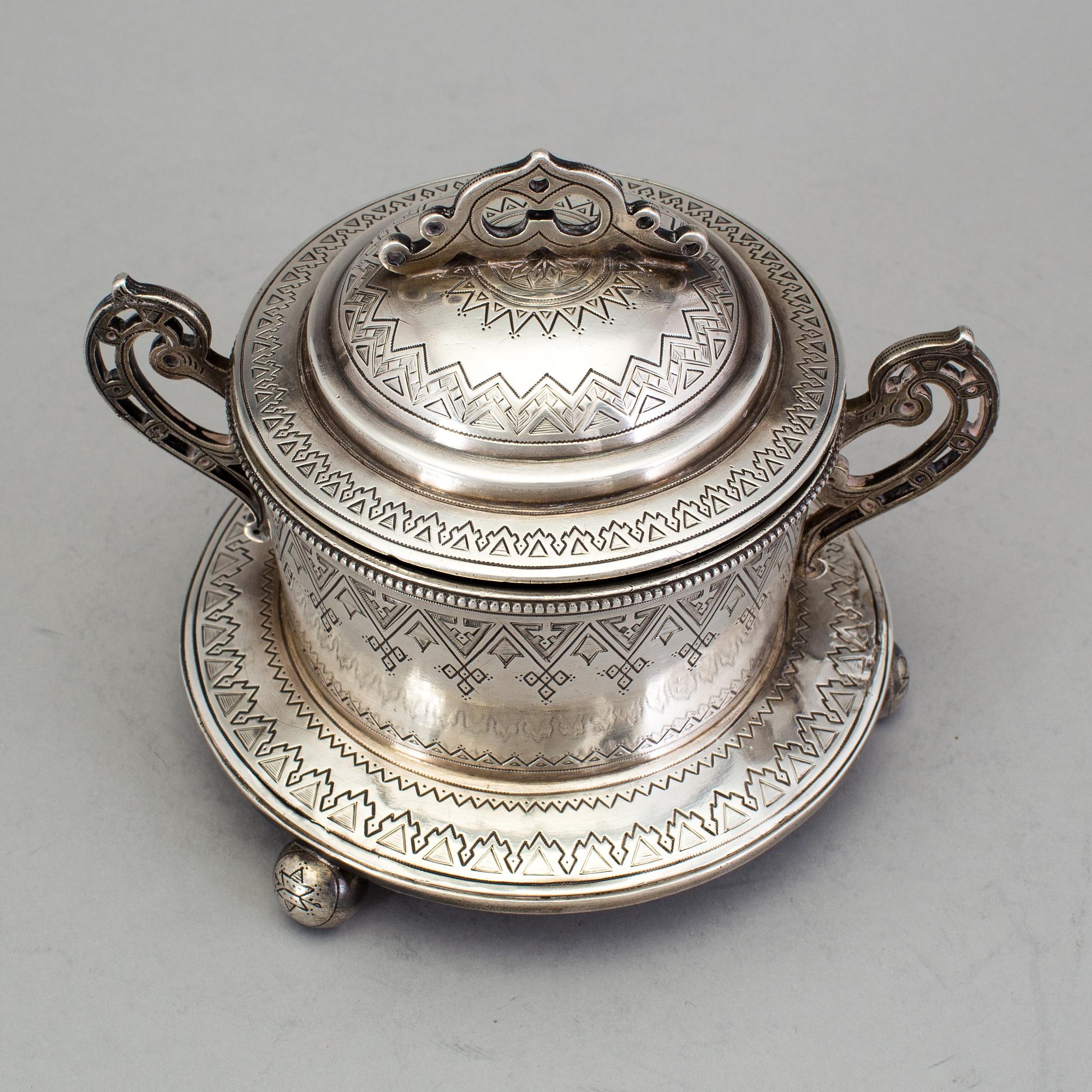A Russian 19th century parcel-gilt sugar-casket, unidentified makers mark, St. Petersburg 1877.