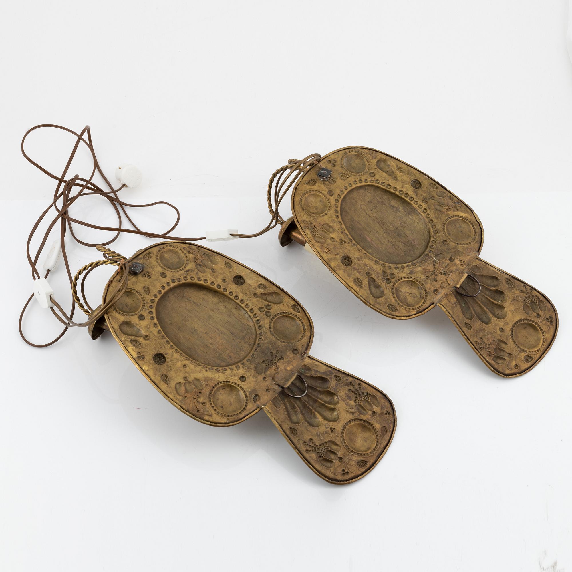 A pair of late 19th century Baroque style brass sconces.