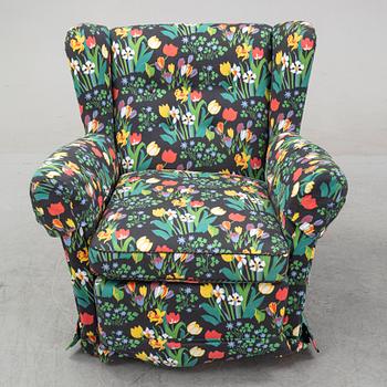 A sofa and wingback chair, later part of the 20th Century.