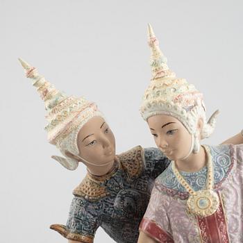 A ceramic "Thailandia" figurine and a figurine head, Lladro, Spain, 1980's.