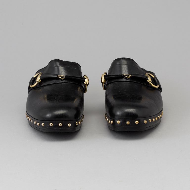 CLOGS by Gucci, size 40.