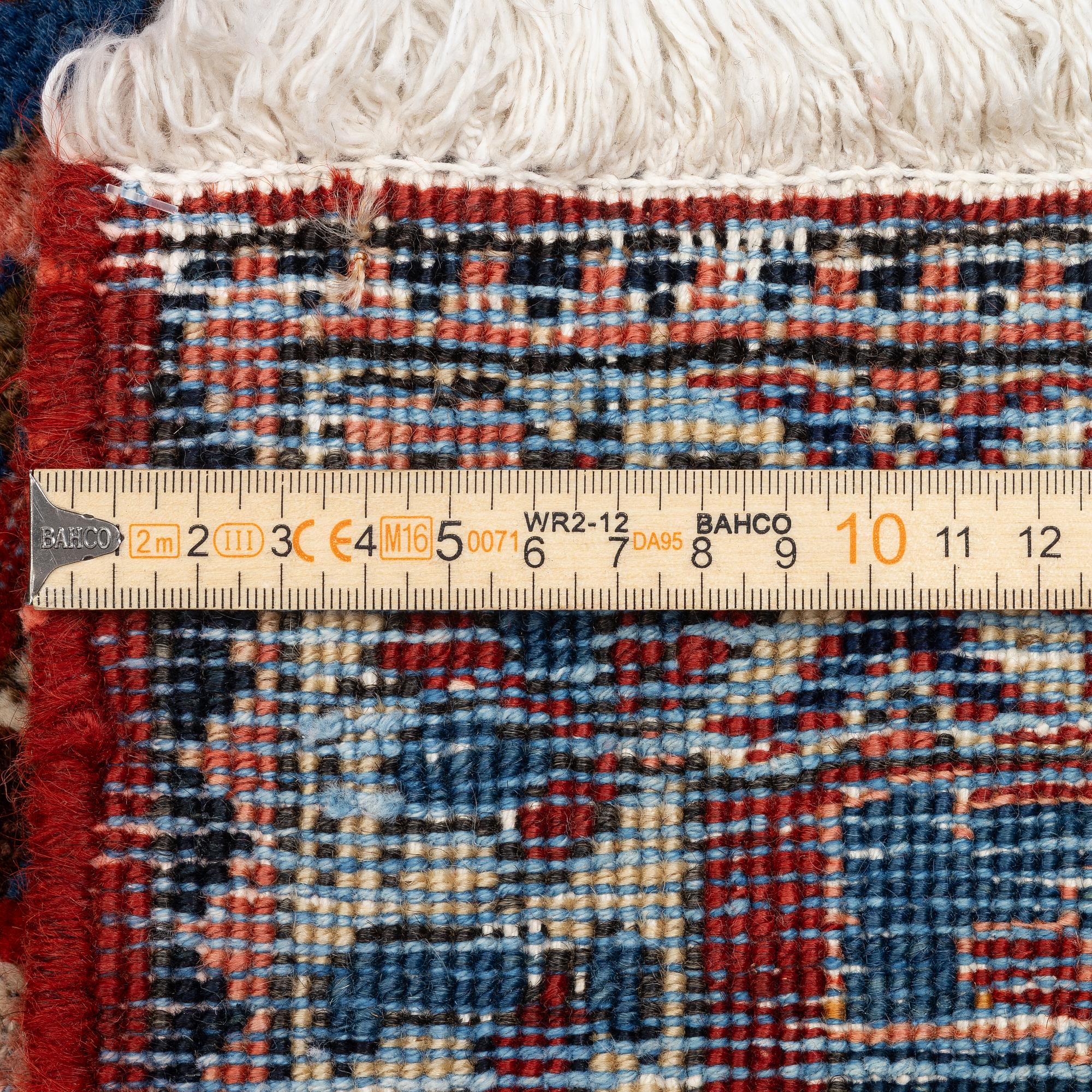 A Baktiari carpet, approx. 340 x 206.