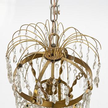 A Gustavian style 9 candle chandelier.