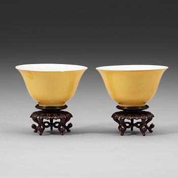 290. A pair of Imperial yellow bowls, Qing dynasty, Yongzheng six-character mark and of the period (1723-1735).