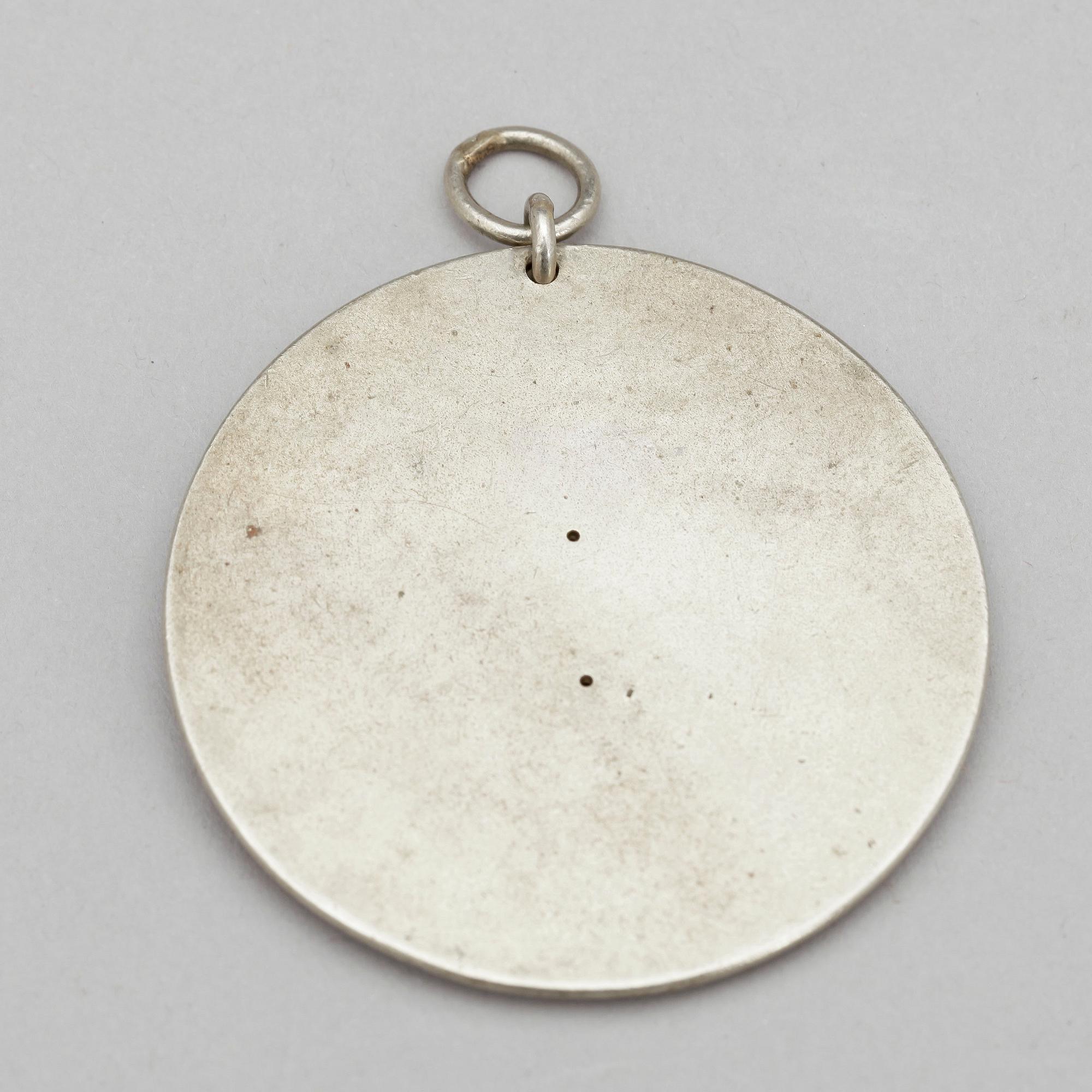 POLISBRICKA, vitmetall, Norrköping.