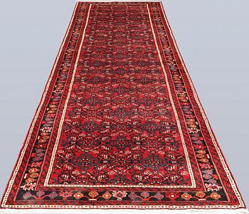 A Hosseinabad runner, c. 418 x 118 cm.