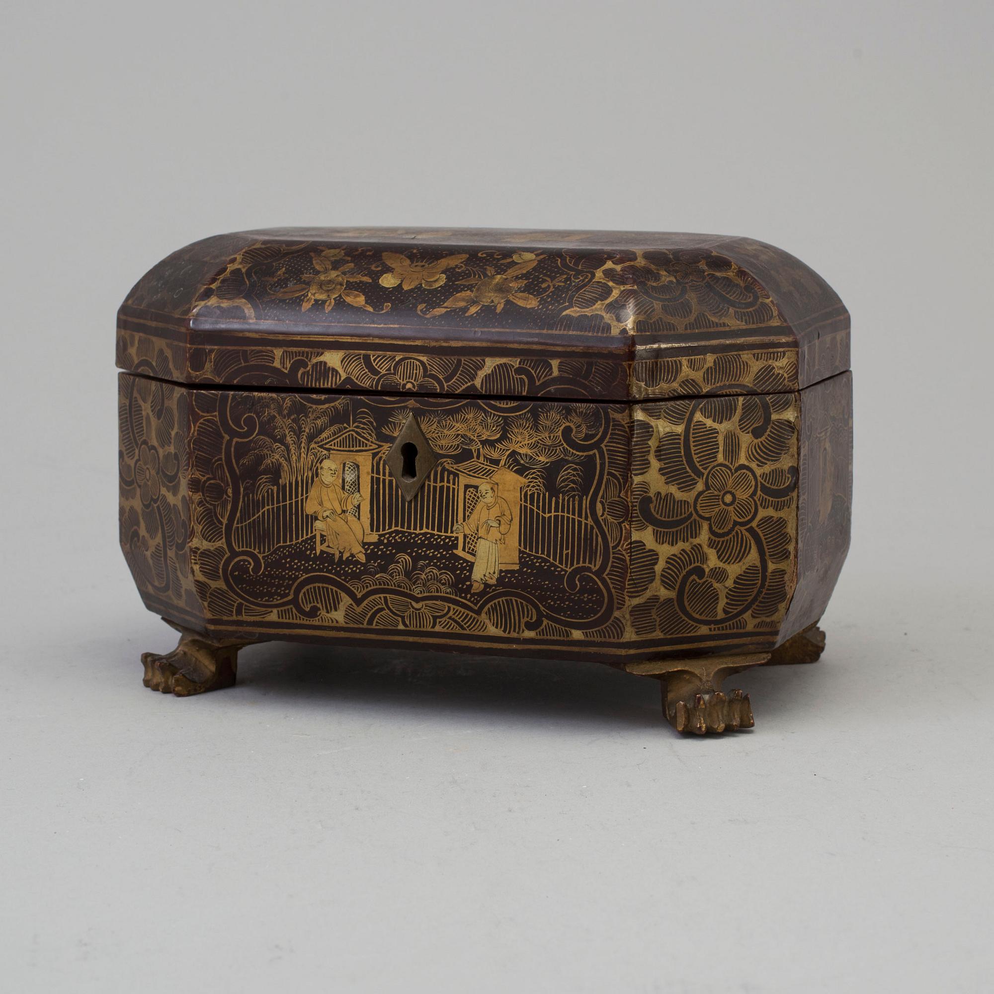 A Chinese Export Lacquerware Tea Caddy with Pewter Fitted Interior, 19th Century.