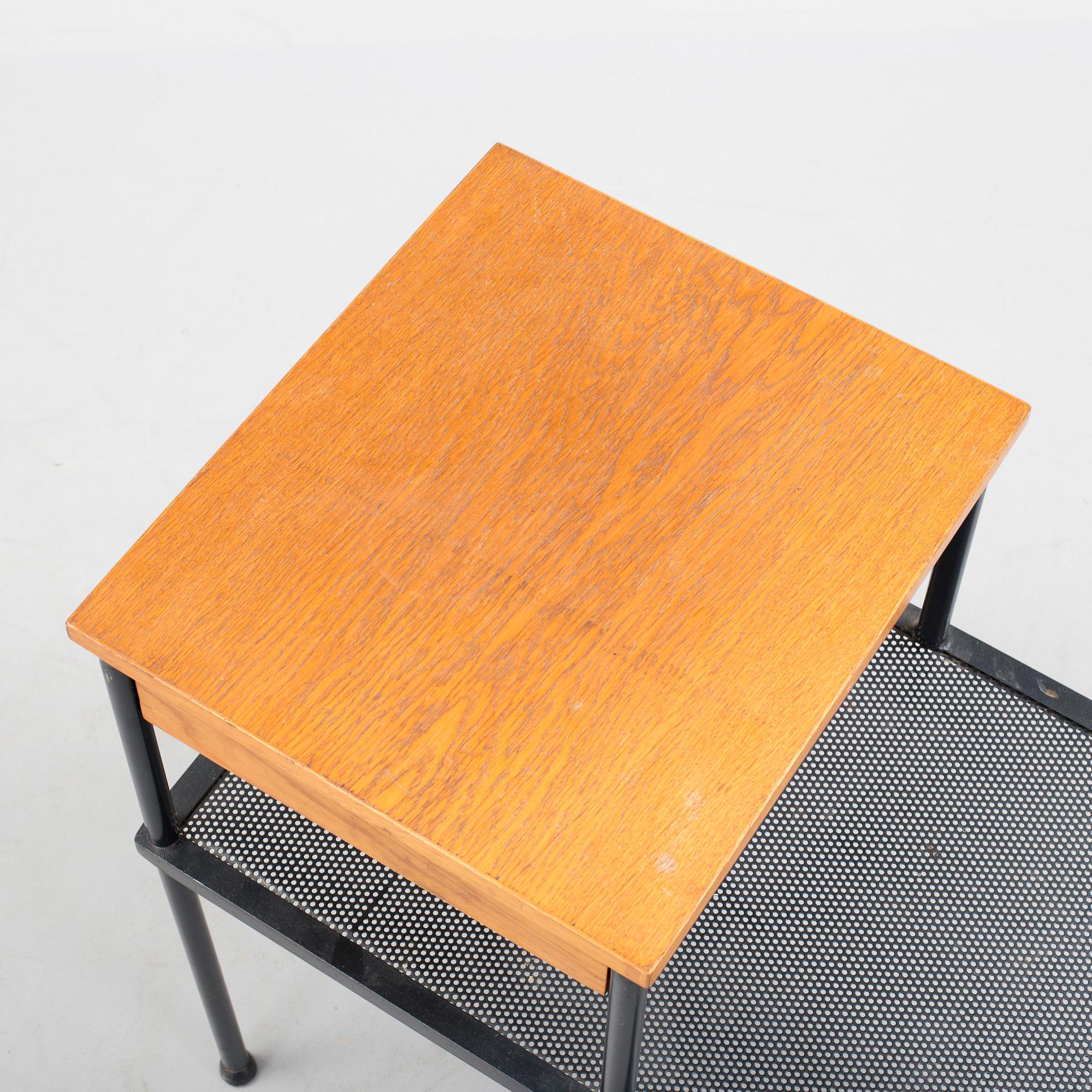 A teak and metal side table, 1950's/60's.