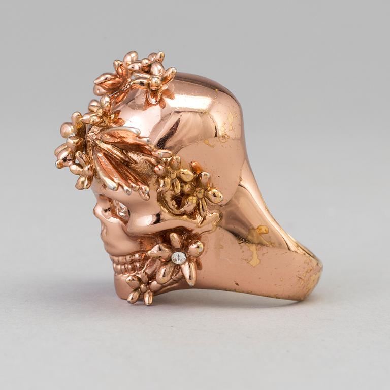 a ring by Alexande McQueen.