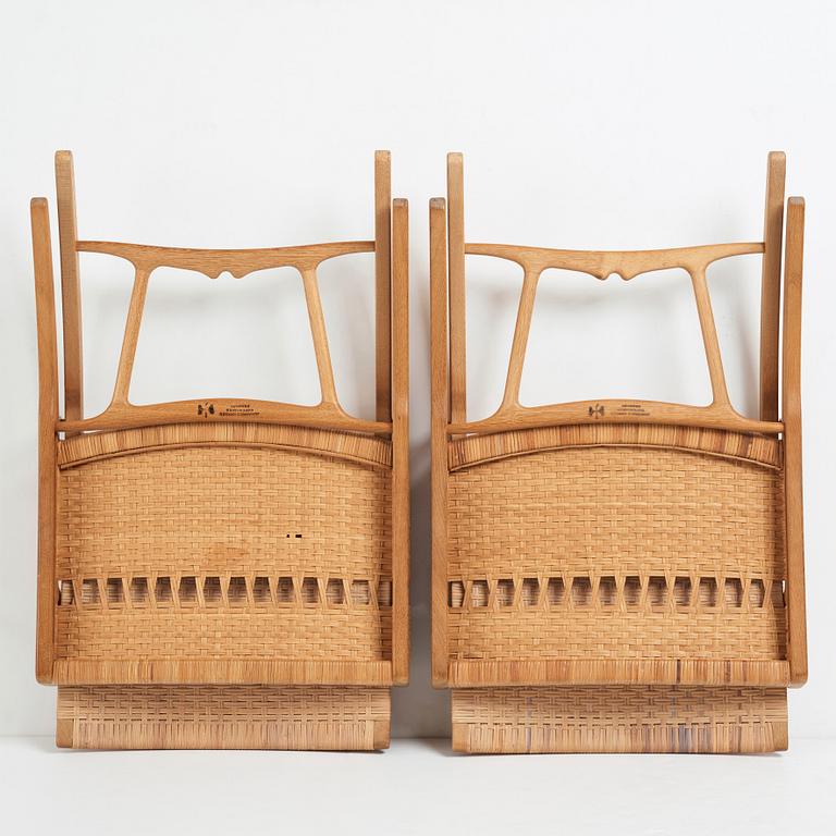 Hans J. Wegner, a pair oak and rattan "model 512" folding chairs by Johannes Hansen, Denmark 1950-60's.