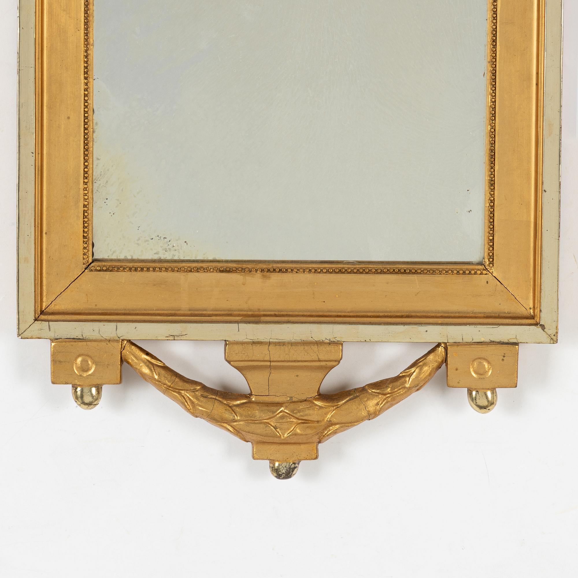 Spegel, gustaviansk stil, omkring år 1900.