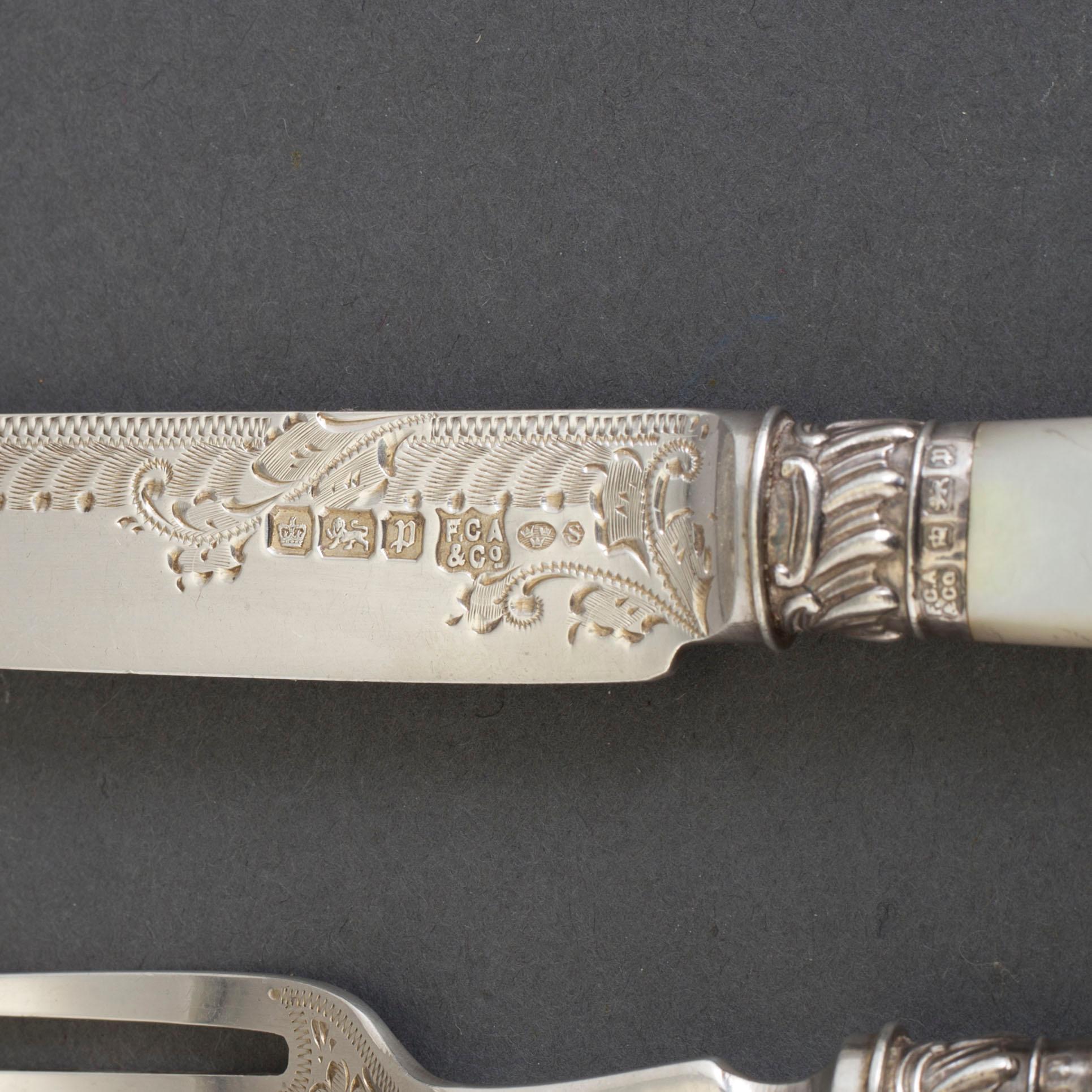 A set of 24 silver and mother of pearl cutlery by  Frederick C. Asman & Co, Sheffield, England, 1907.