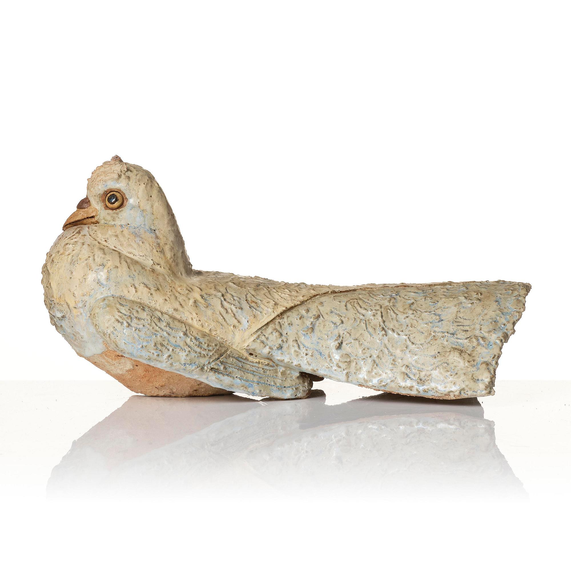 Tyra Lundgren, a chamotte stoneware sculpture of a bird, executed in her studio, Bredkvie, Gotland 1974.