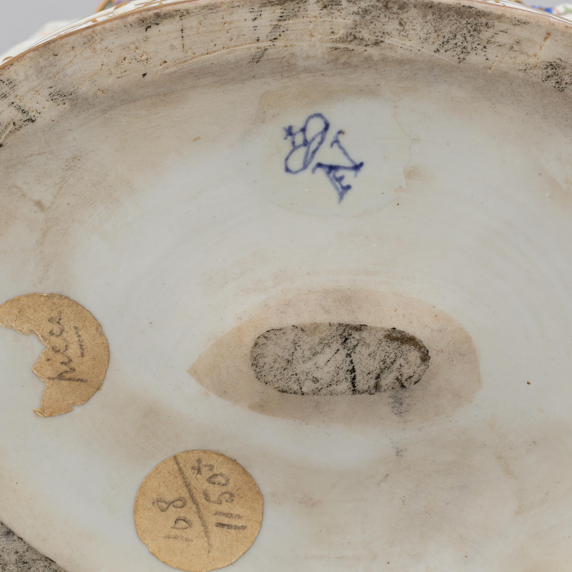 A porcelain figurine, Naples style mark, first half of the 20th century.