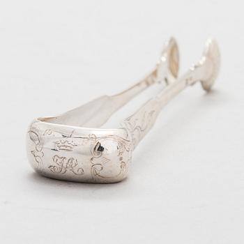 A Russian silver sugar tong, mark of Carl Johann Tegelsten, Saint Petersburg, 1844.