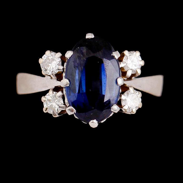 RING, 18 k vitguld, briljantslipade diamanter samt blå safir, svenska stämplar 1982, IBG, Norrköping.