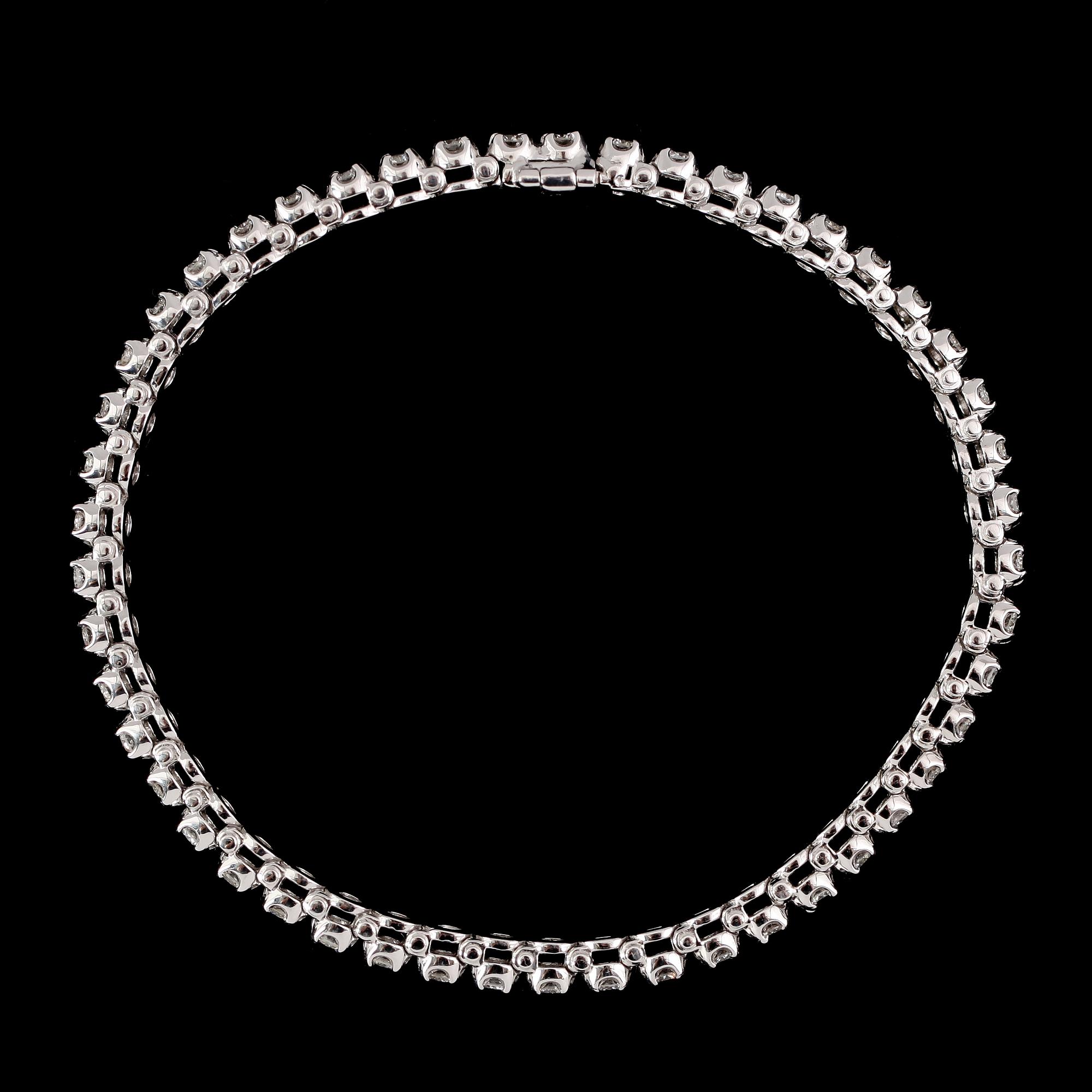 ARMBAND, 14 k vitguld, Rivière, 49 briljantslipade diamanter tot ca 2.80 ct.
