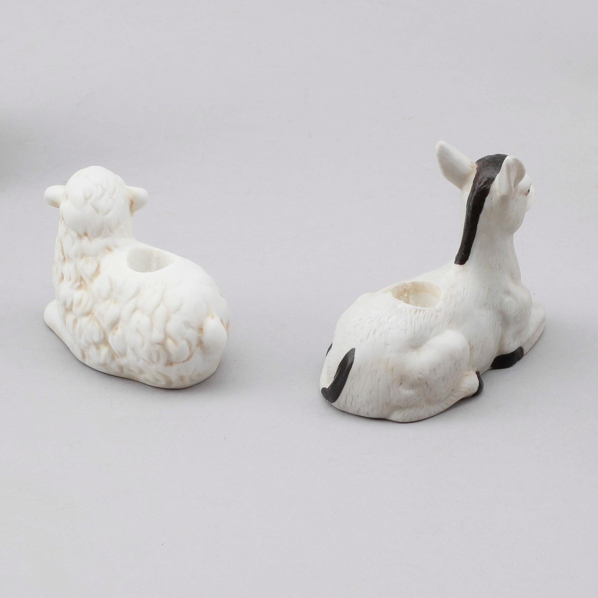 JULKRUBBA, 15 delar, porslin, efter Jenny Nyström, Kalmar Länsmuseum.