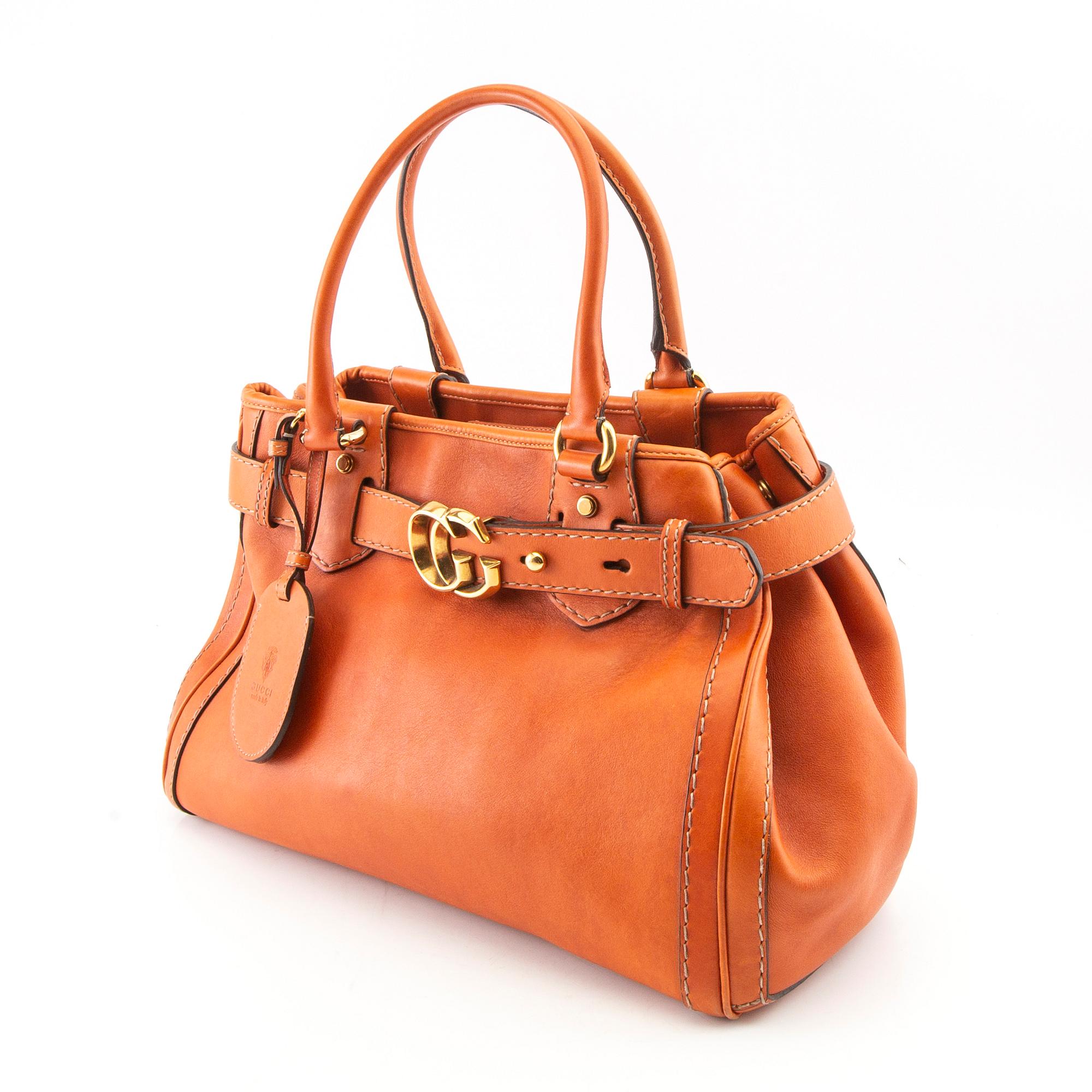 Gucci, "Running Tote" Bag and Wallet.