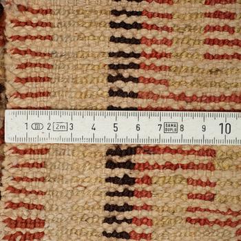 MATTO, an antique Khotan, ca 296,5 x 181 cm.