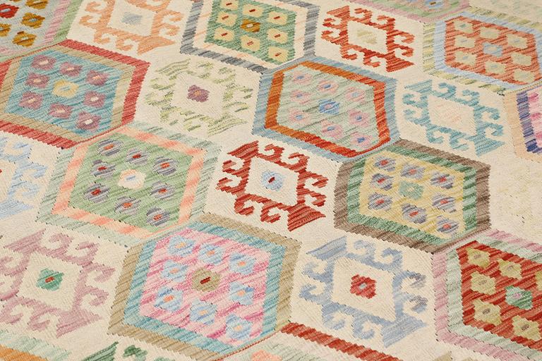 A Kilim rug, approx. 299 x 245 cm.