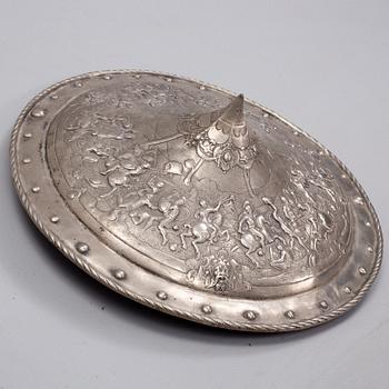 A decorative iron sheild, circa 1900.