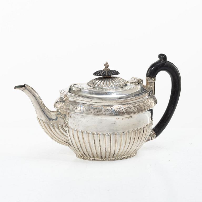 An English silver teapot, mark of Walker & Hall (John Edward Bingham), Sheffield, 1886.
