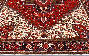 A carpet, Heriz, c. 307 x 246 cm.