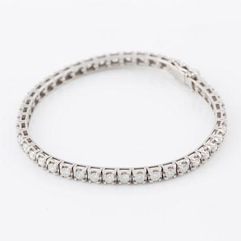 Tennis bracelet, 18K white gold with brilliant-cut diamonds.