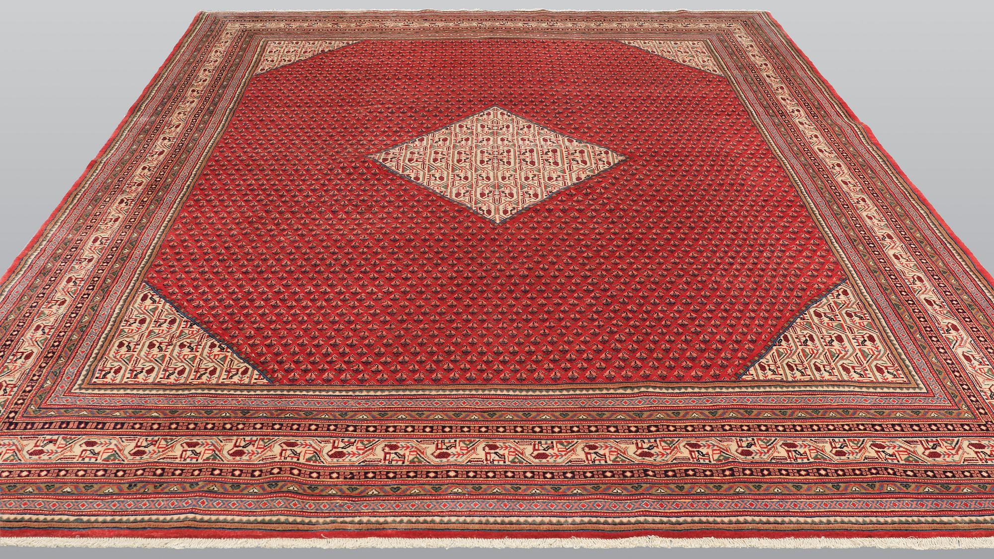 A Sarouk Mir carpet, approx. 398 x 296 cm.