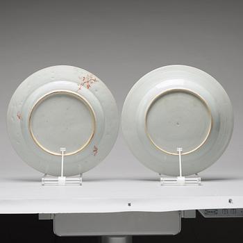 A pair of famille rose 'double peacock' dishes, Qing dynasty, Qianlong (1736-95).