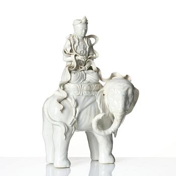 A large blanc-de-chine figure of Guanyin riding an elephant, late Qing dynasty/early 20th Century.