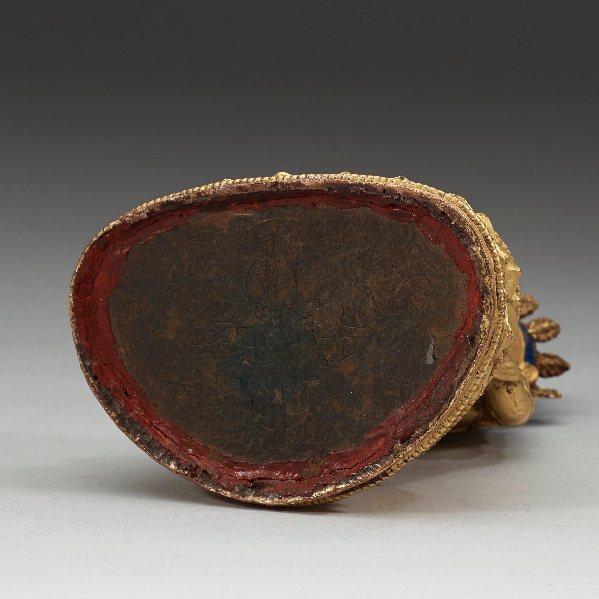 FIGURIN, delvis förgylld och bemålad brons. Vajrasattva, Tibet, 1700-tal.