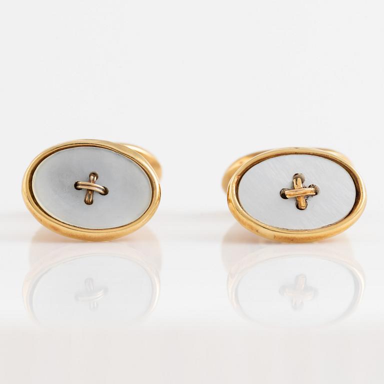 18K gold and mother of pearl cufflinks.