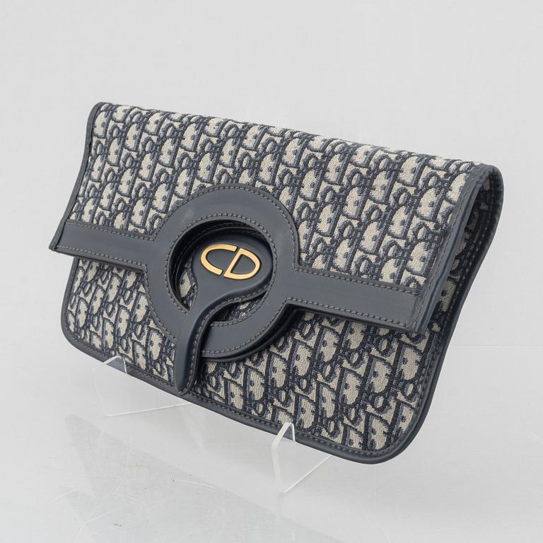 Christian Dior, bag/clutch, "Oblique fold-over convertible clutch".