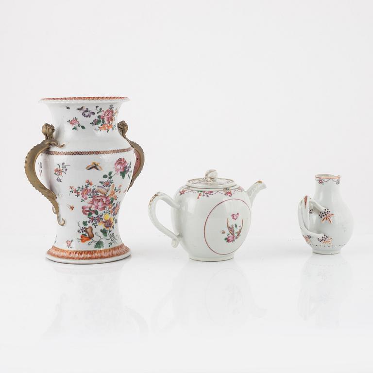 A Chinese export famille rose urn, teapot and jug, Qing dynasty, 18th century.