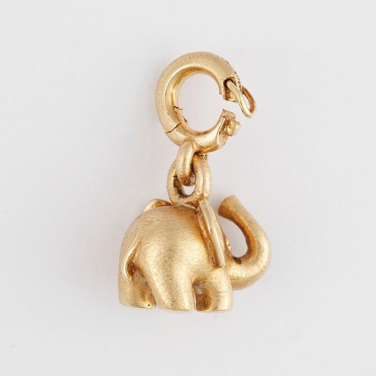 BERLOCK, Ole Lynggaard, "My little World", 18k guld med briljantslipad diamant ca0,01ct. Vikt 8,7g.