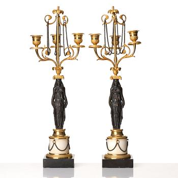 A pair of late Gustavian circa 1800 three-light candelabra, attributed to F L Rung.