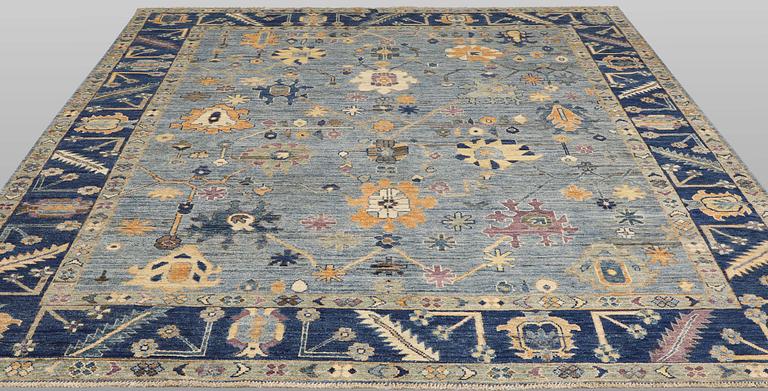 A carpet, Ziegler design, approx. 302 x 250 cm.
