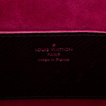 Louis Vuitton, a 'Twist MM Epi' bag.