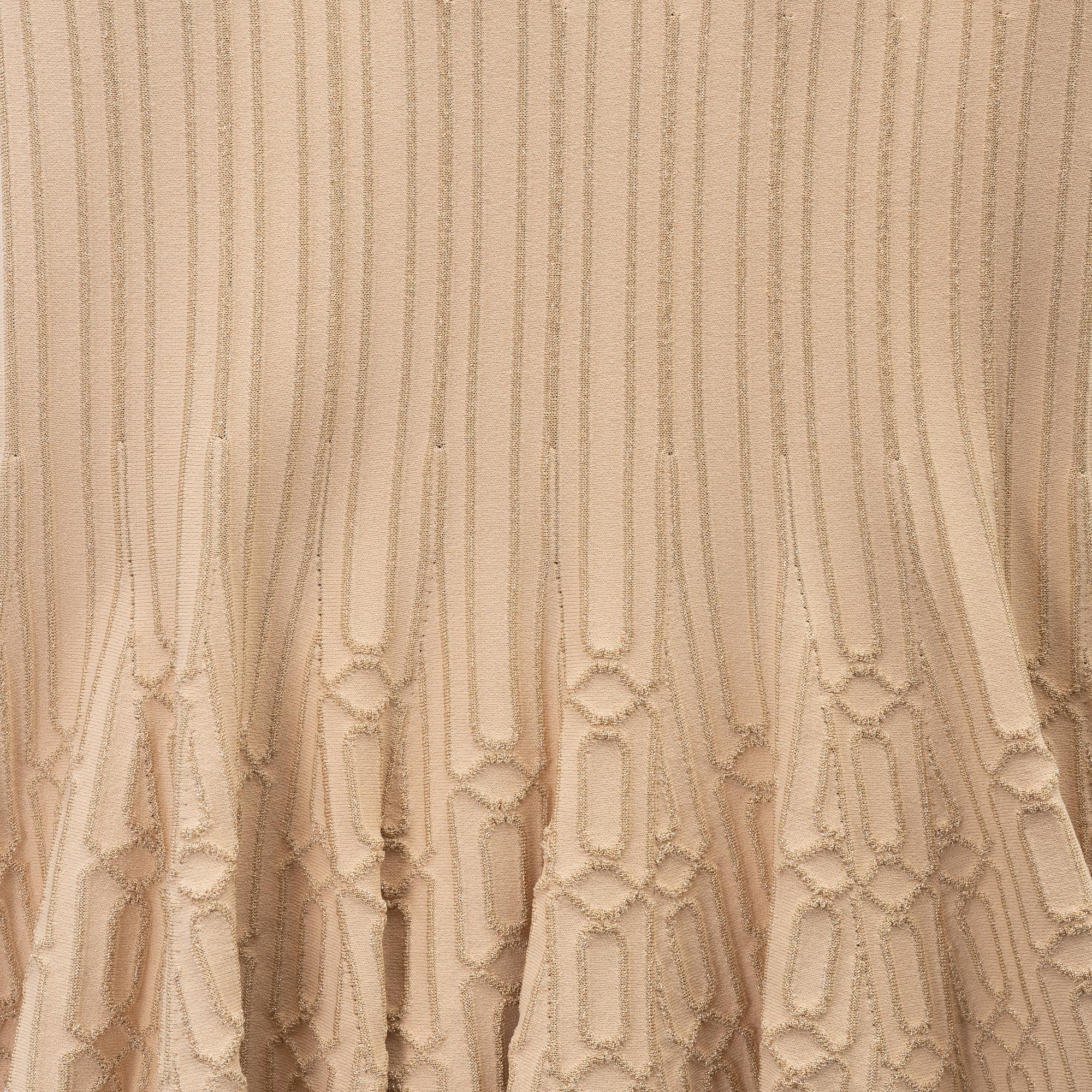 Alaïa, a beige patterned dress, size 36.