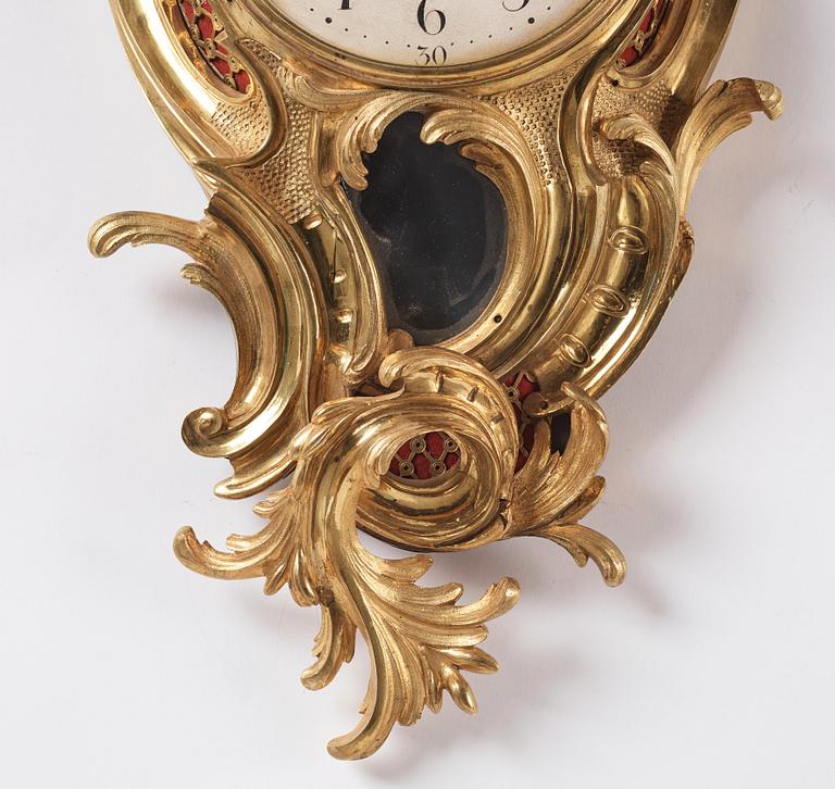 A Swedish Rococo gilt bronze wall clock, second part of the 18th century.