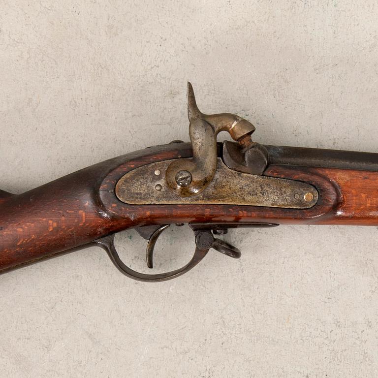 A percussion rifle, Swedish, m/1851 alteration model.