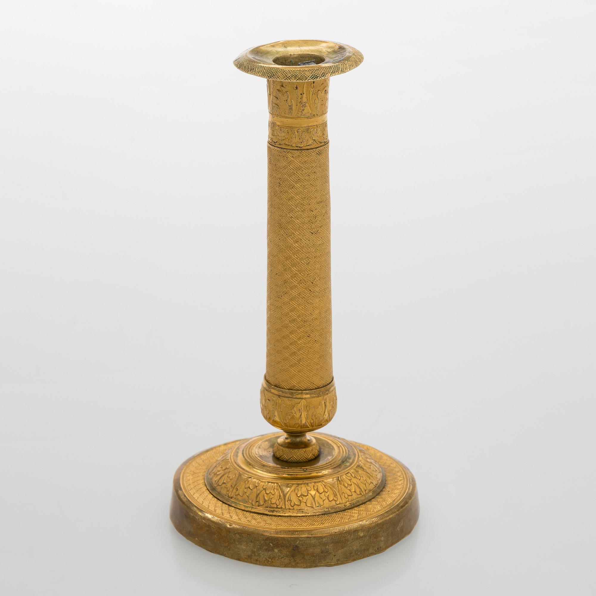 An early 19th century French Empire candlestick.